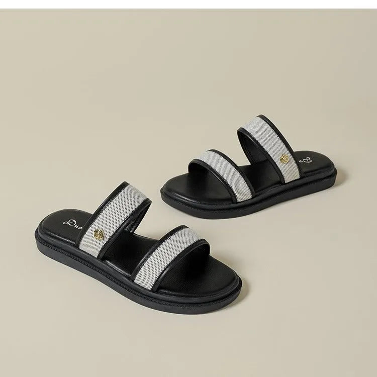 Women's brown retro soft bottom flip-flops with an artificial PU upper on a plain background.