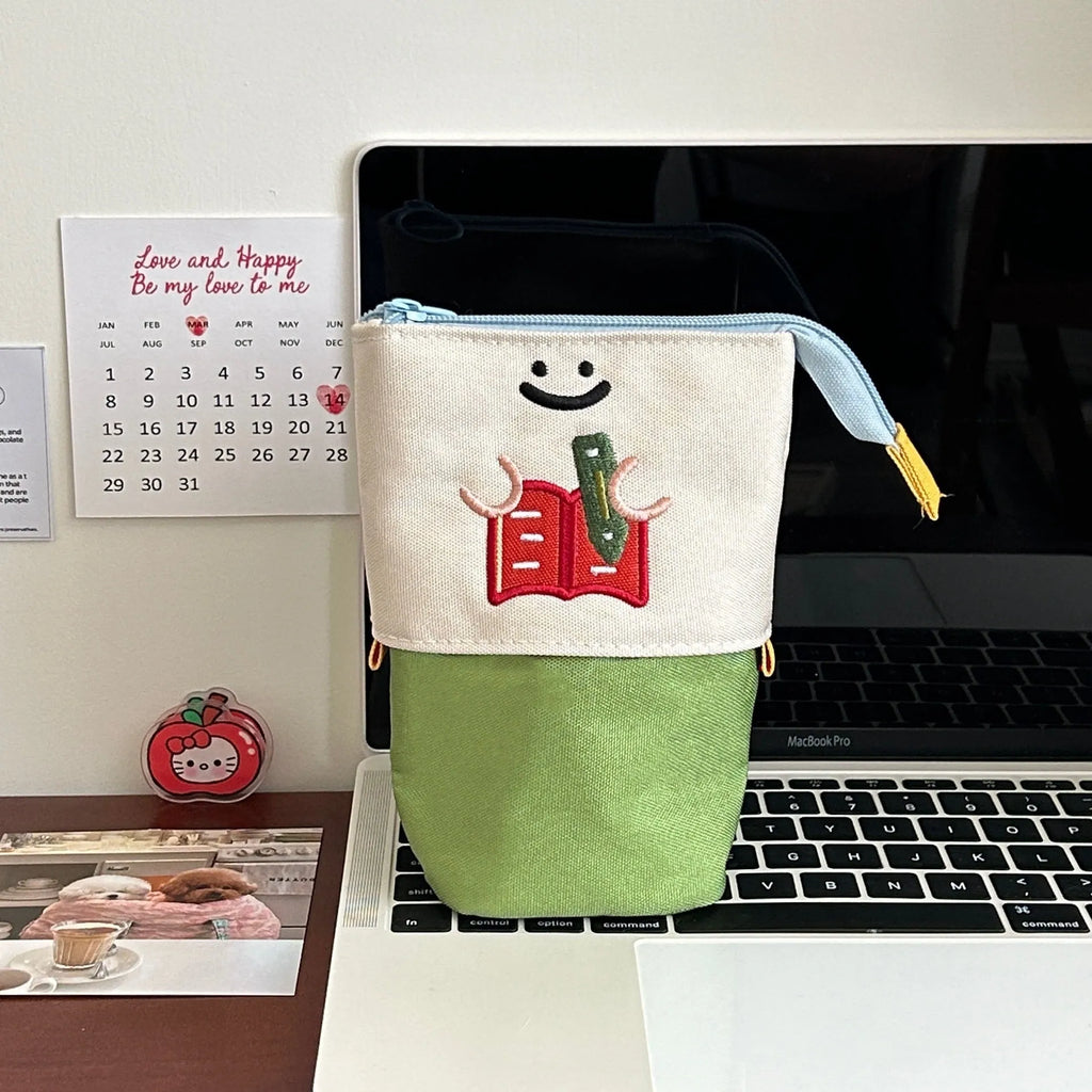Korean-style cartoon collapsible pencil case in brown or green oxford fabric