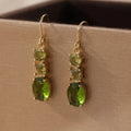 Green copper geometric earrings with quadrilateral shape, minimalist bohemian style