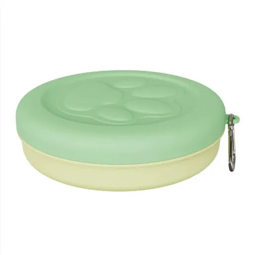 Portable plastic dog feeding bowl in green and pink colour options for outdoor use
