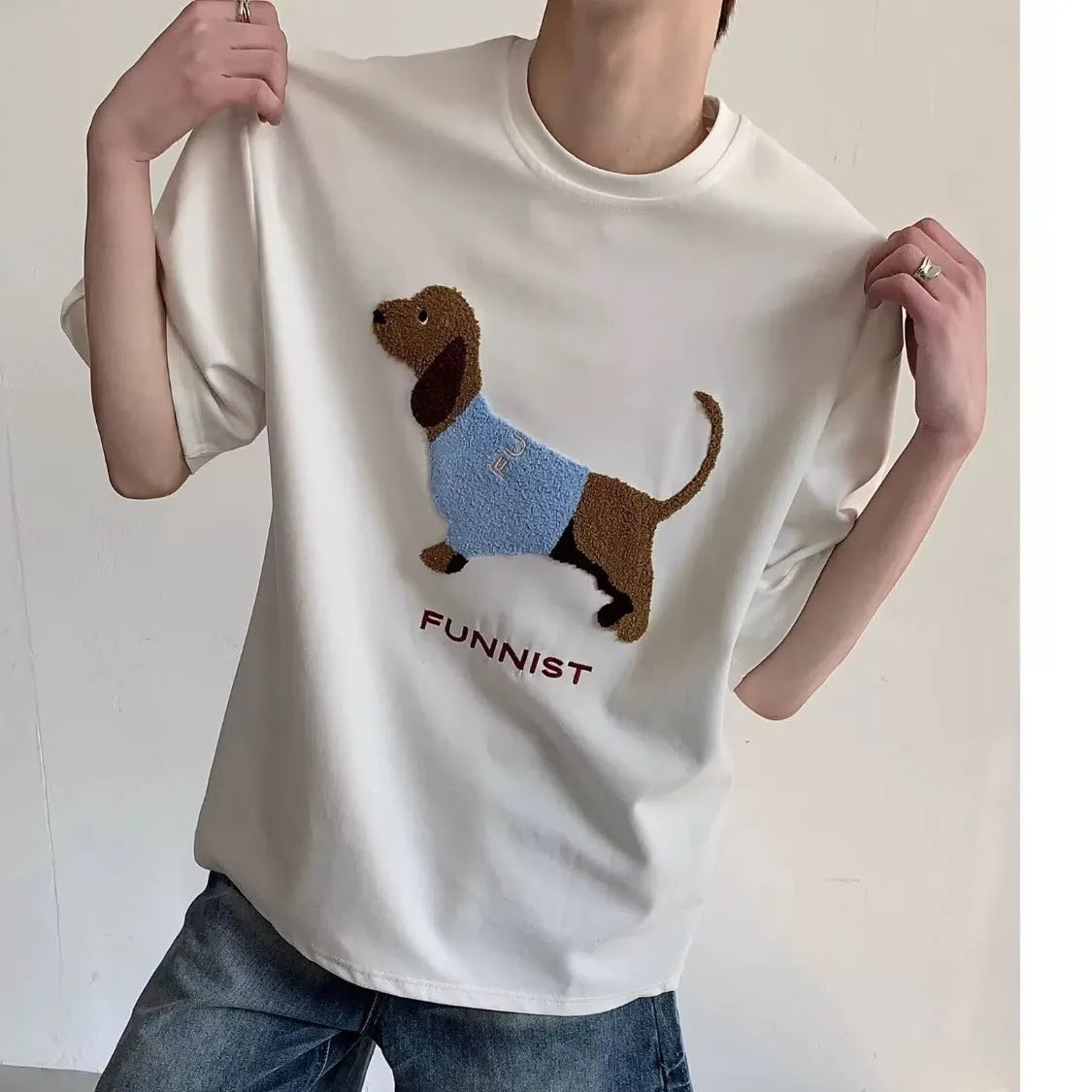 Men's grey t-shirt with embroidered sausage dog design on chest, round neck, short sleeves.