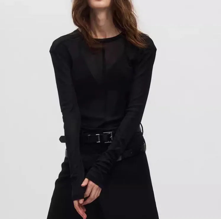 Black slim-fit long sleeve PU pullover with a see-through mesh texture on a model.