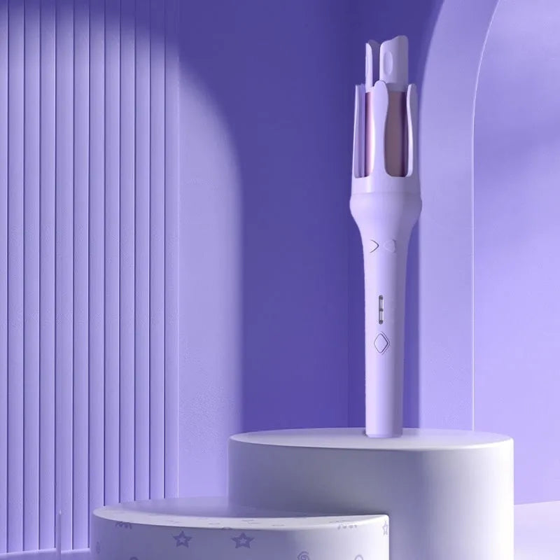 Automatic hair curler with 32mm ceramic barrel in pink, showing wired power cord and included US/EU travel adapters.