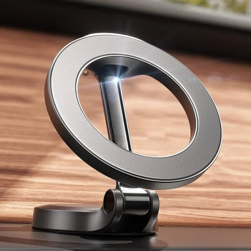 All-metal magnetic car phone mount with foldable arms in Qian colour on dashboard