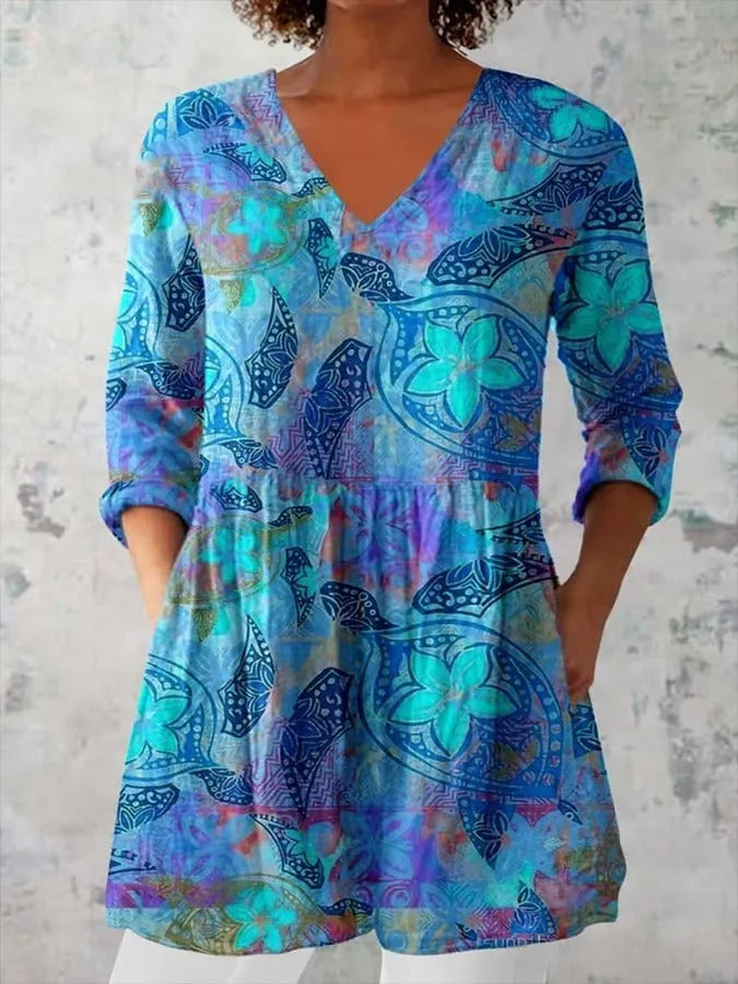 Women's slim-fit long-sleeved retro top with a digital print design on polyester fabric.