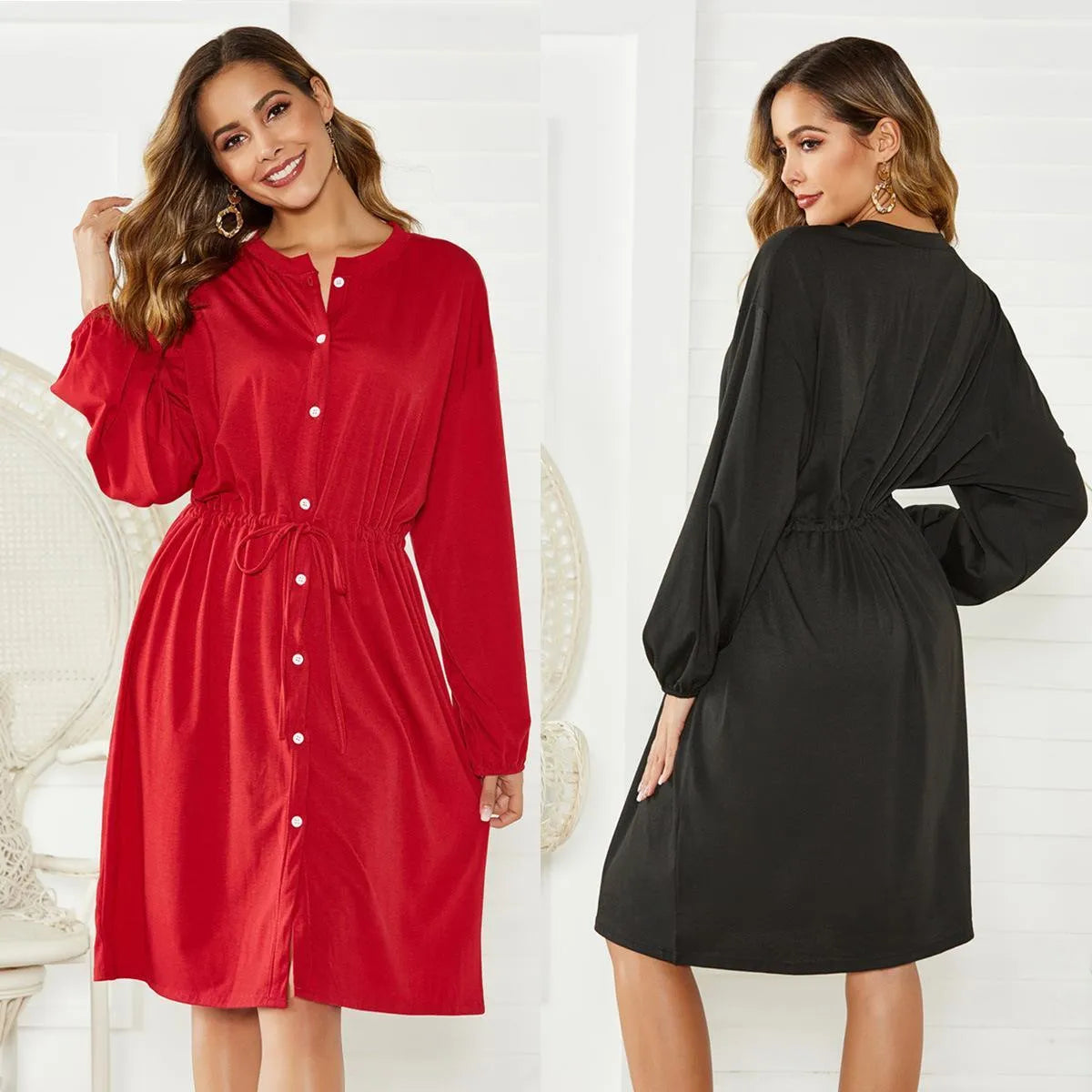 Women's black A-line midi dress with cinched waist belt and long sleeves on hanger