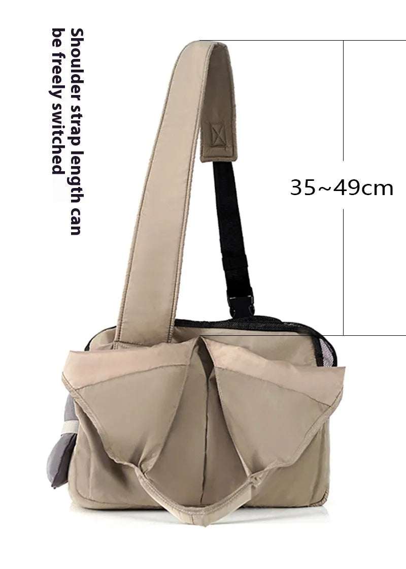 Apricot coloured cloth pet handbag measuring 41cm by 16cm by 28cm