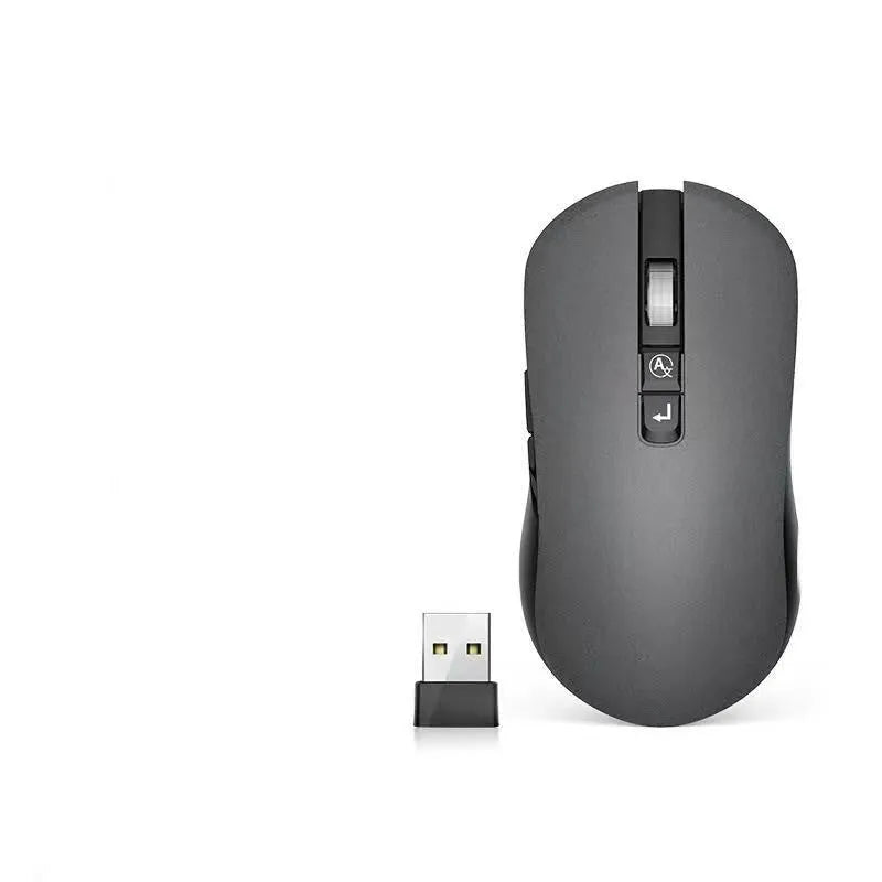 IFLYTEK voice translation wireless gaming mouse with USB receiver on a desk.