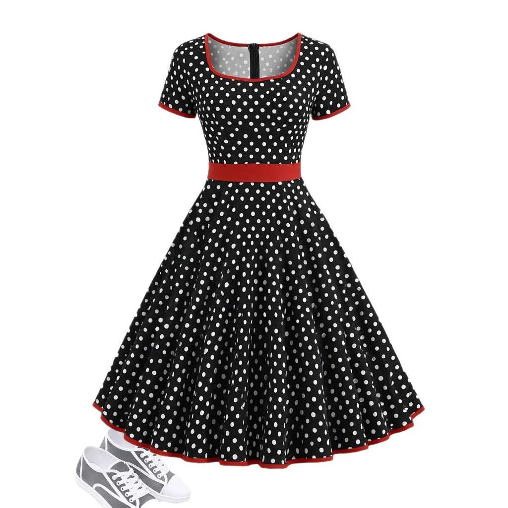 Multicolour polka dot dress with square collar, short sleeves, zip front, and pleated mid-length skirt.