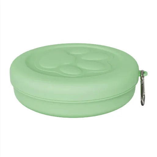 Portable plastic dog feeding bowl in green and pink colour options for outdoor use