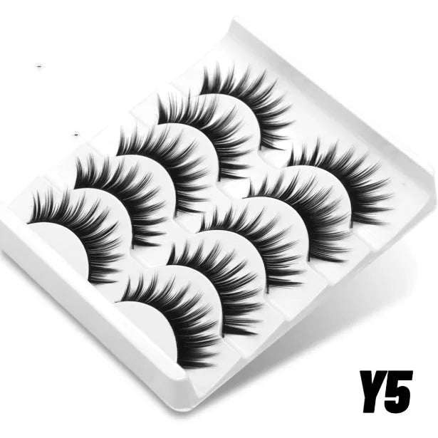 Box of artificial fibre false eyelashes with glue in six style options for a natural long look.