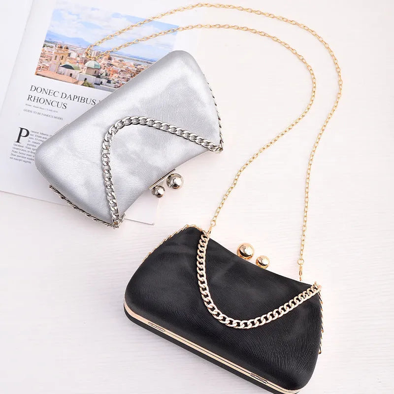 Embossed PU leather pillow chain shoulder bag in silver with lock closure