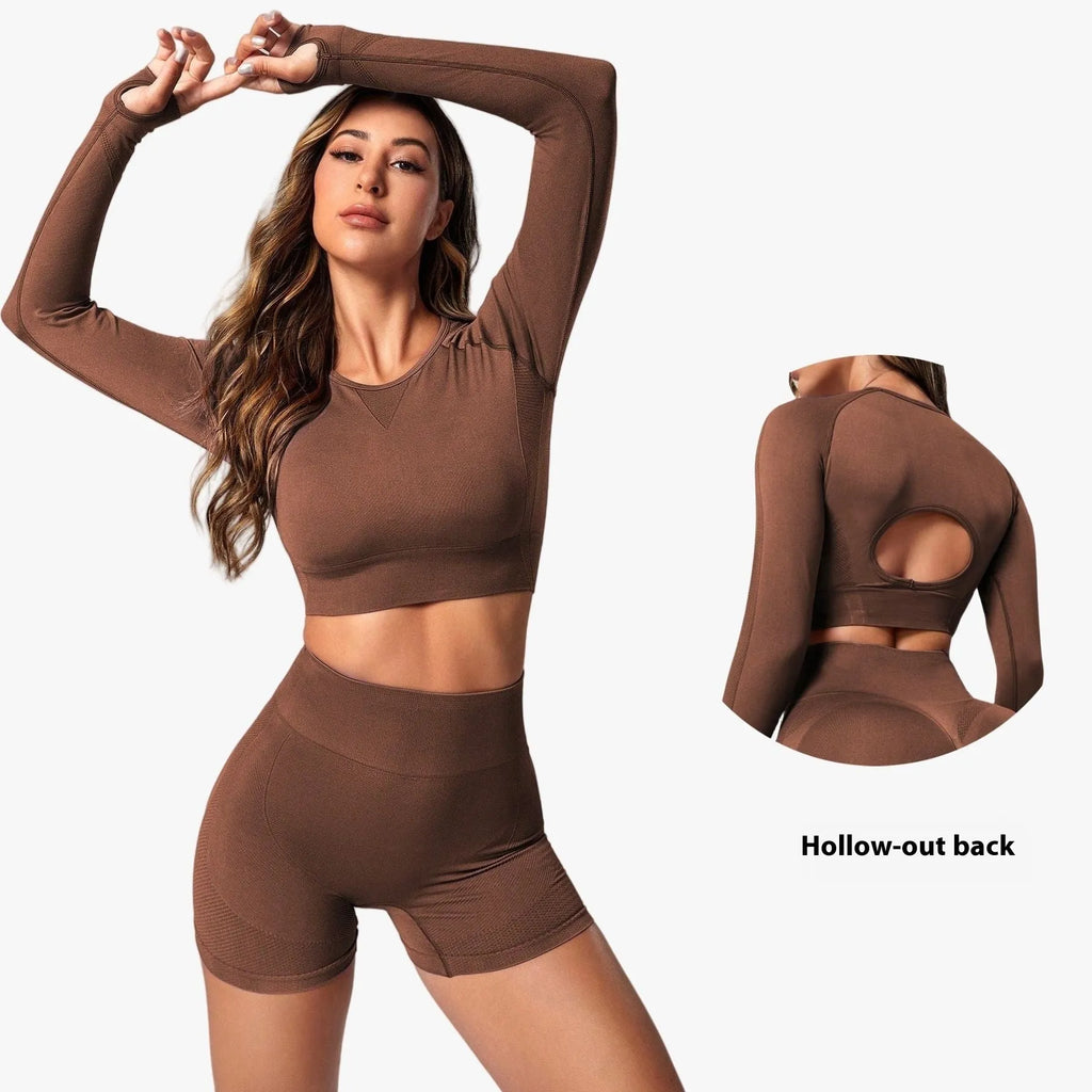 Women's black yoga suit set with high-waisted leggings and long sleeve top for fitness