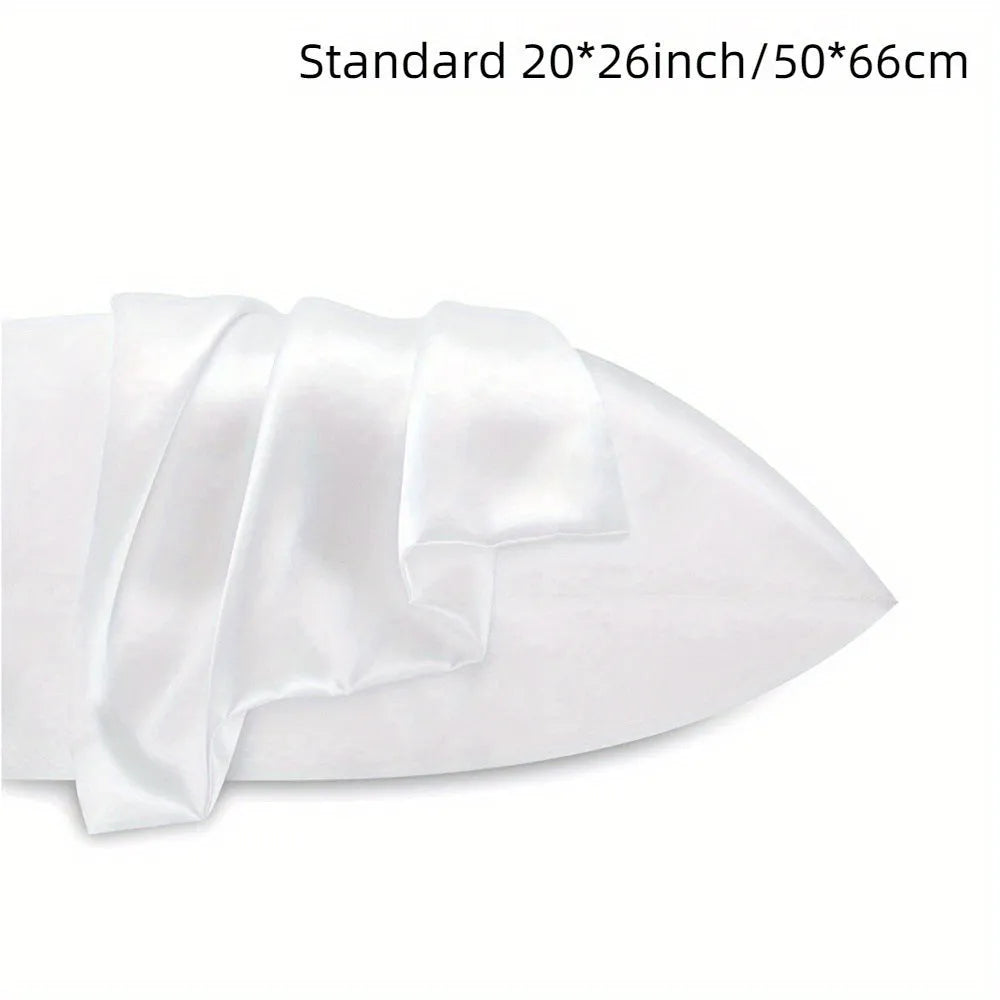 Pair of solid colour satin cloth pillowcases in polyester fibre available in twelve colours and four sizes