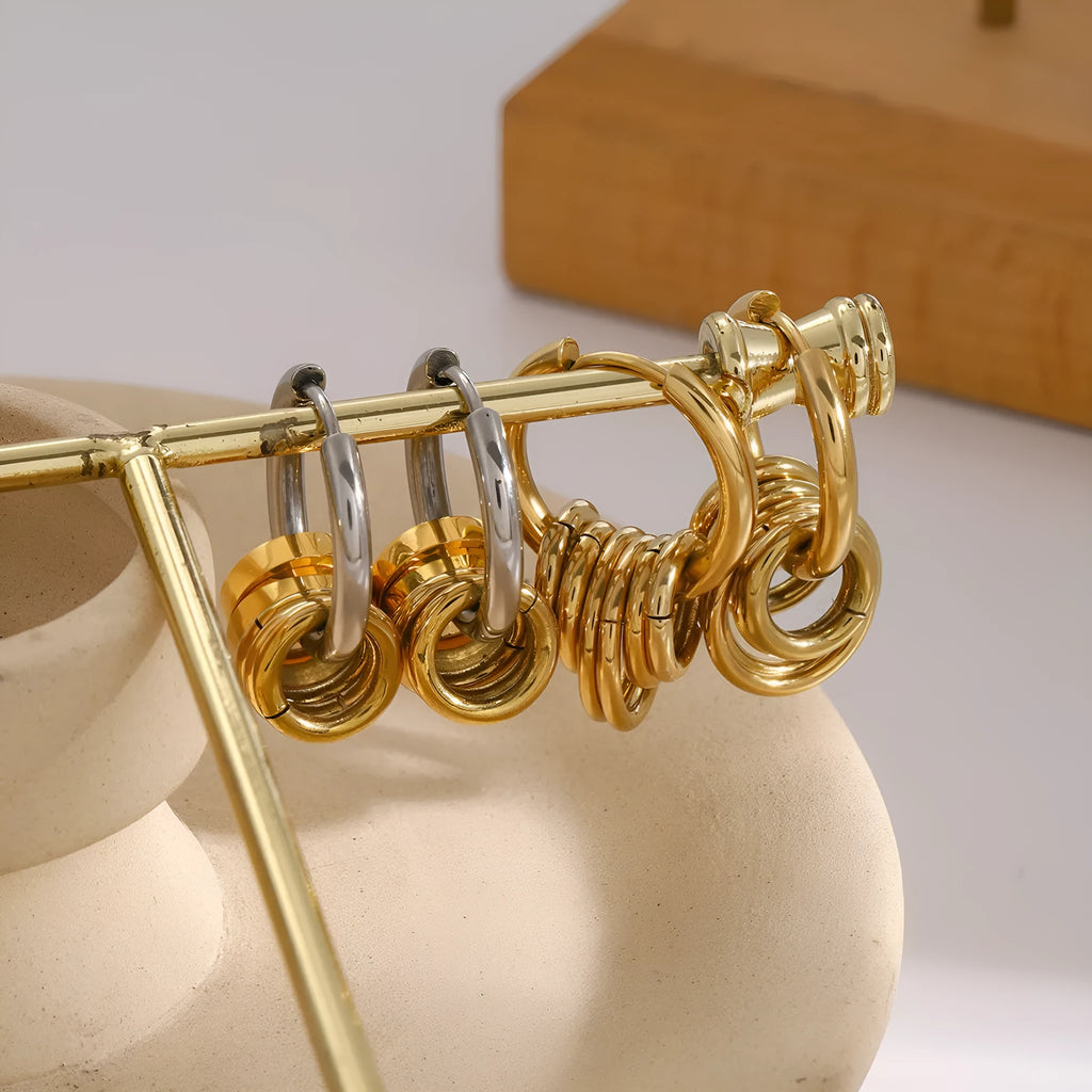 A pair of stainless steel electroplated earrings with a colour matching finish in a simple ins style.