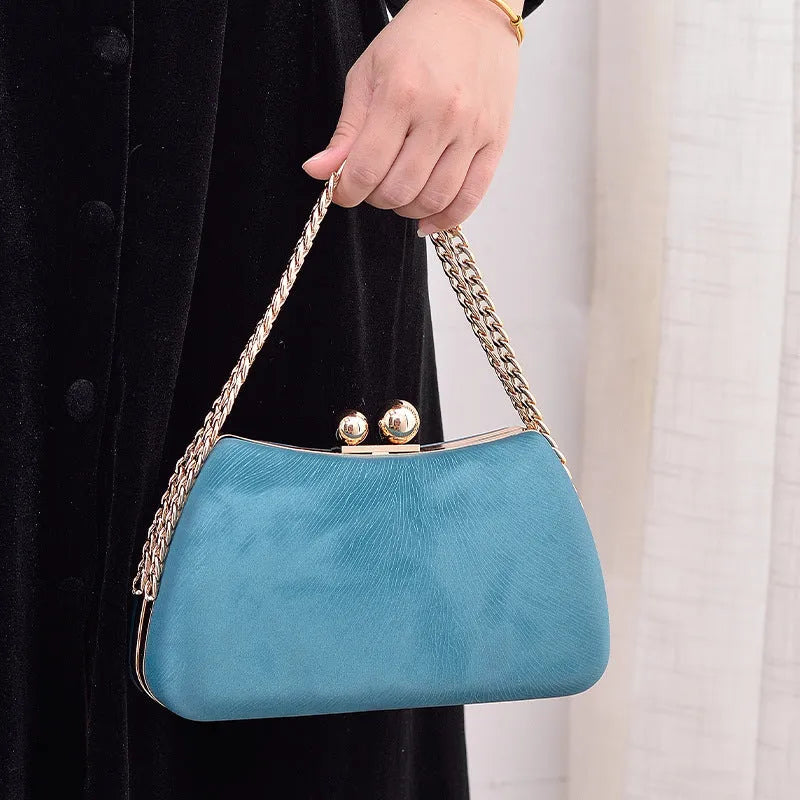 Embossed PU leather pillow chain shoulder bag in silver with lock closure