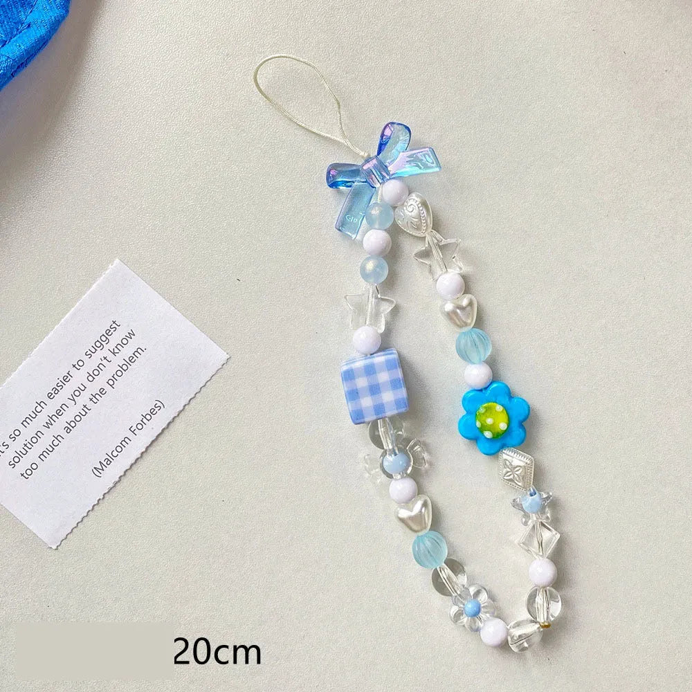 Colourful beaded flower mobile phone lanyard with detachable metal lobster clasp in blue, pink, or yellow designs