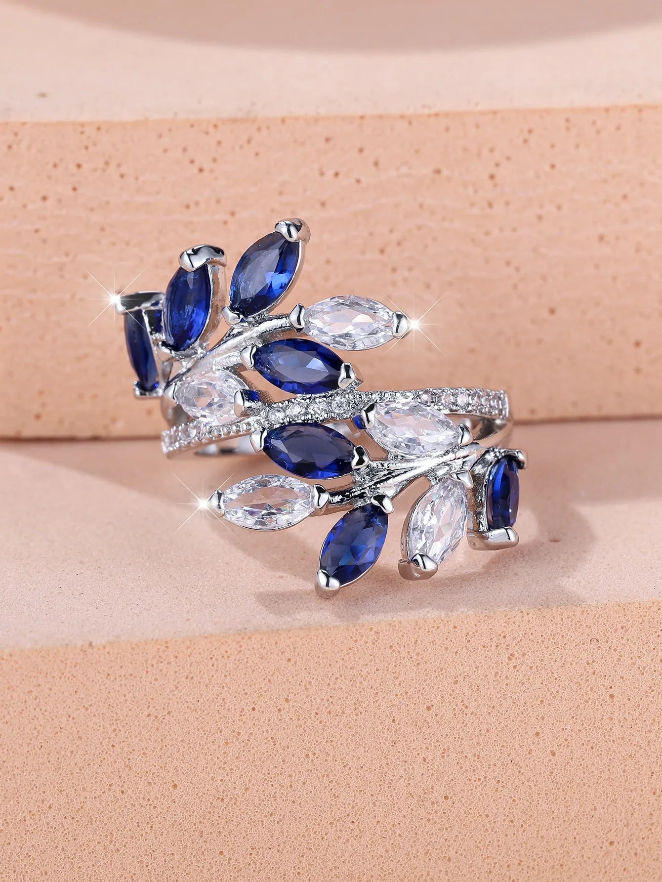 Adjustable copper leaf ring with horse eye zircon accents in multiple colour variations