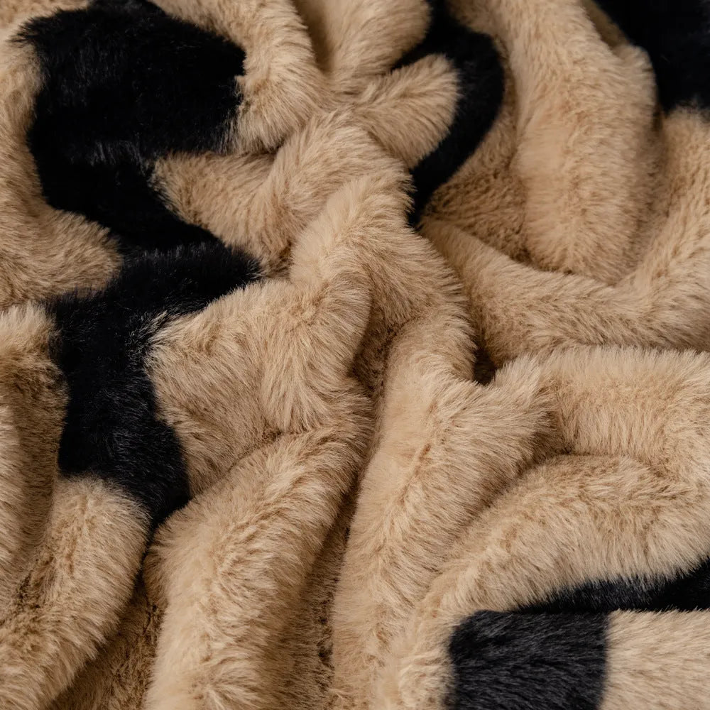 Zebra pattern non-slip flannel sofa cover with matching pillowcase in caramel colour.
