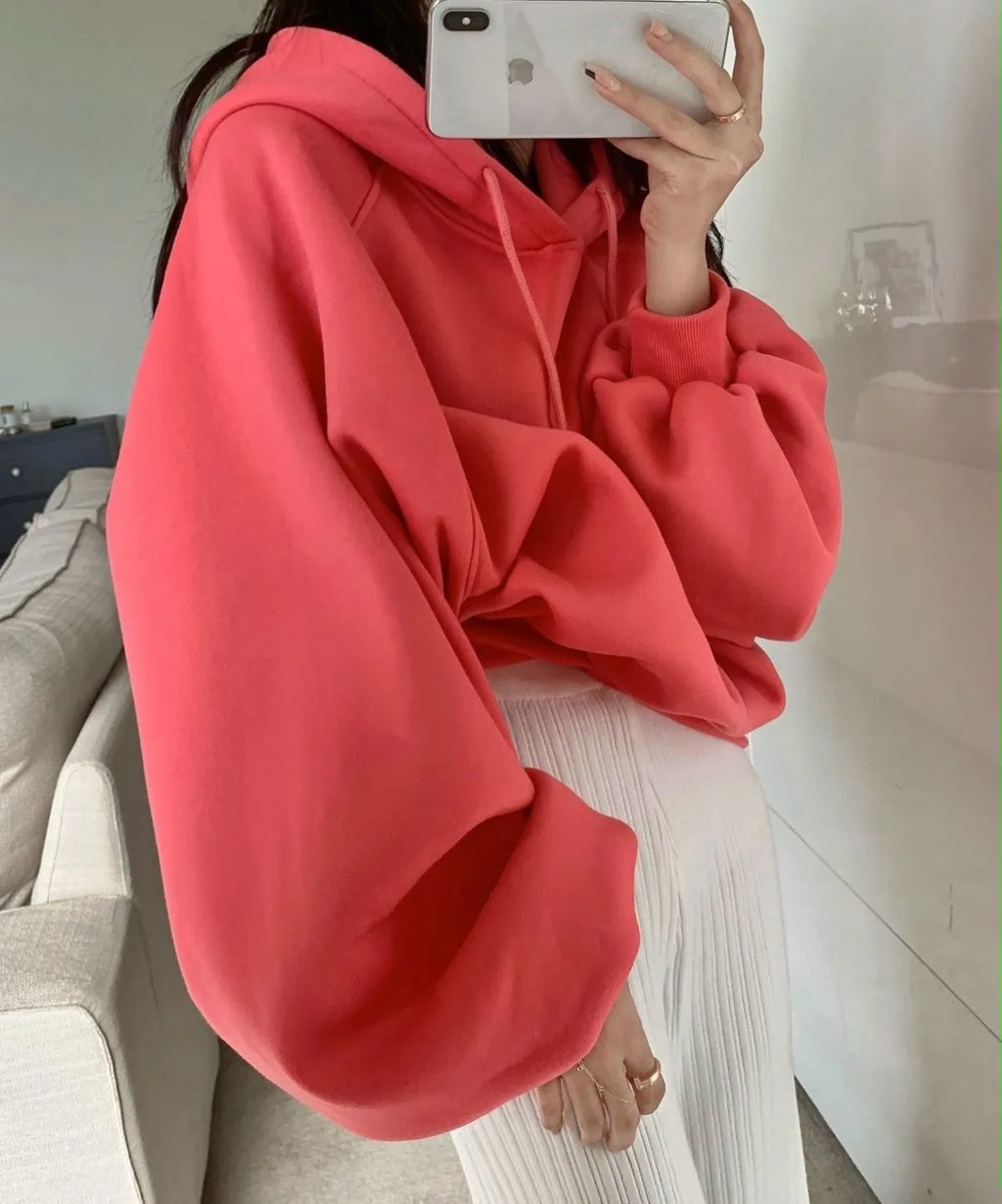 Watermelon red women's sleeveless Mulberry Silk hoodie on a hanger.