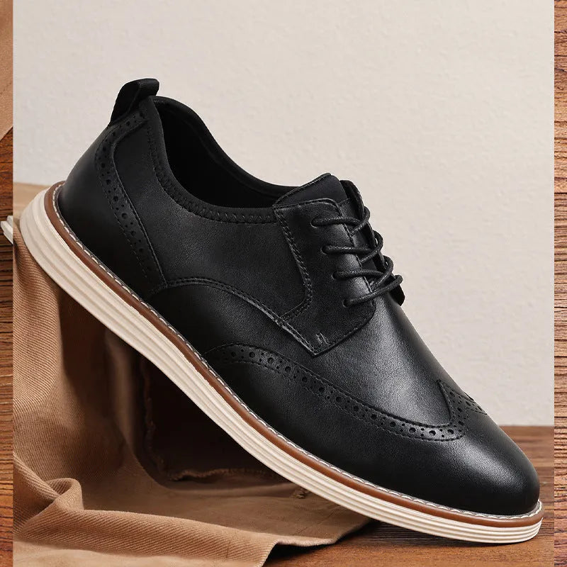 Men's black slip-on business casual shoes with decorative carved detailing and TPR soles
