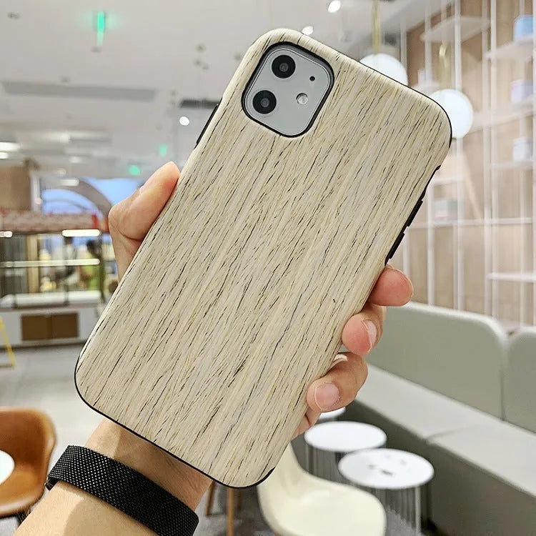 Slim wooden iPhone back cover in natural rosewood, teak, black rose, and walnut finishes