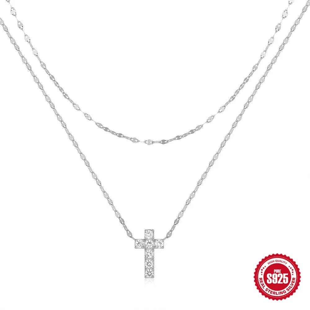 S925 Sterling Silver necklace with a geometric double-layer cross pendant featuring twin diamond detailing.