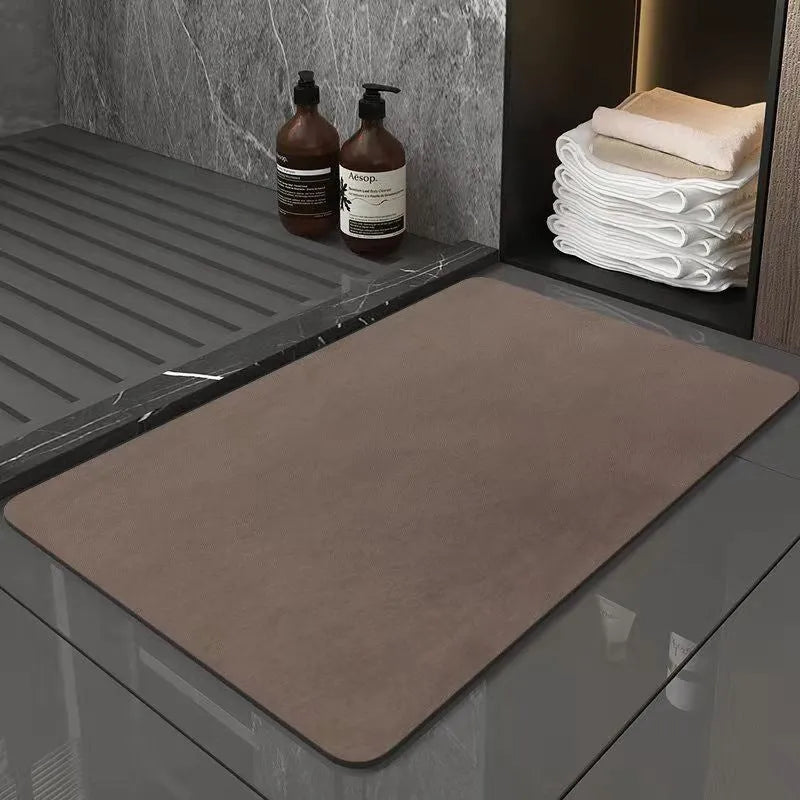 Modern simple diatom ooze bathroom mat in rectangular oval shape with non-slip backing