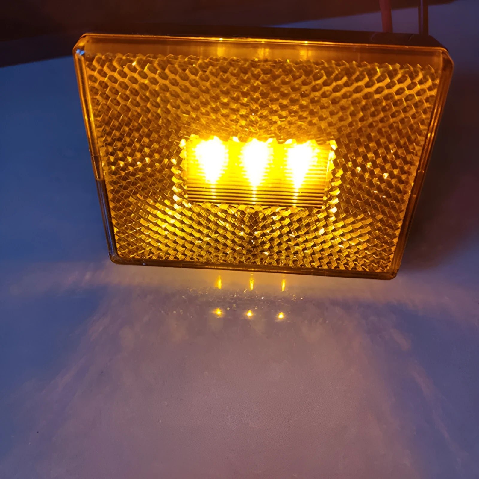 Red LED trailer side marker clearance lamp with 19cm wire on white background.