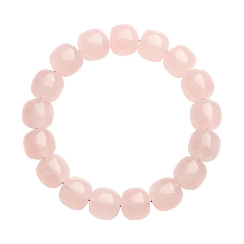 Pink bamboo crystal barrel bead bracelet with 11-12mm geometric beads on wrist