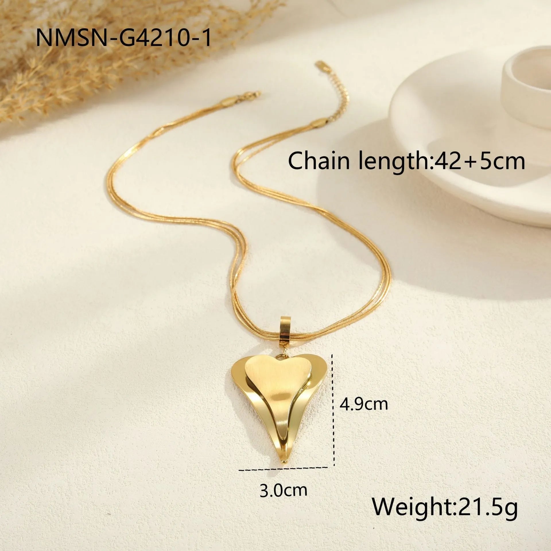 Stainless steel geometric snake bones chain necklace with double heart pendant in gold finish