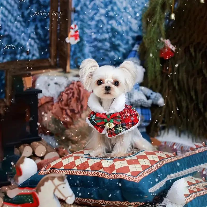 Red holiday pet scarf with bell motif wrapped around dog's neck for Christmas