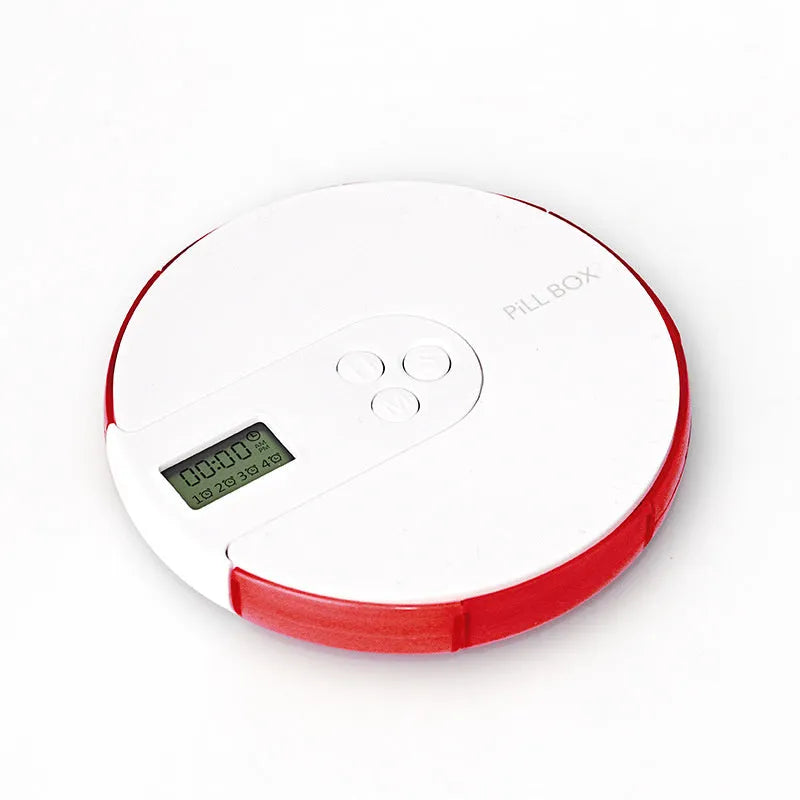 Seven-compartment alarm clock pill dispenser showing medication storage and electronic display