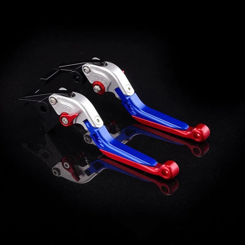 Pair of anodised metal motorcycle horn handle clutch levers with six-speed adjustable length, shown in a selection of colour finishes