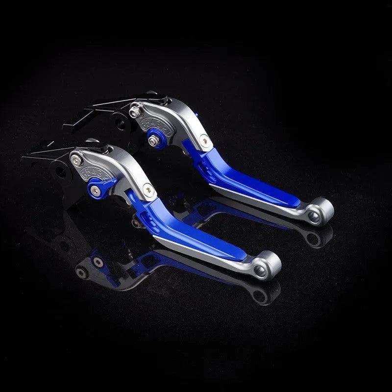 Pair of anodised metal motorcycle horn handle clutch levers with six-speed adjustable length, shown in a selection of colour finishes