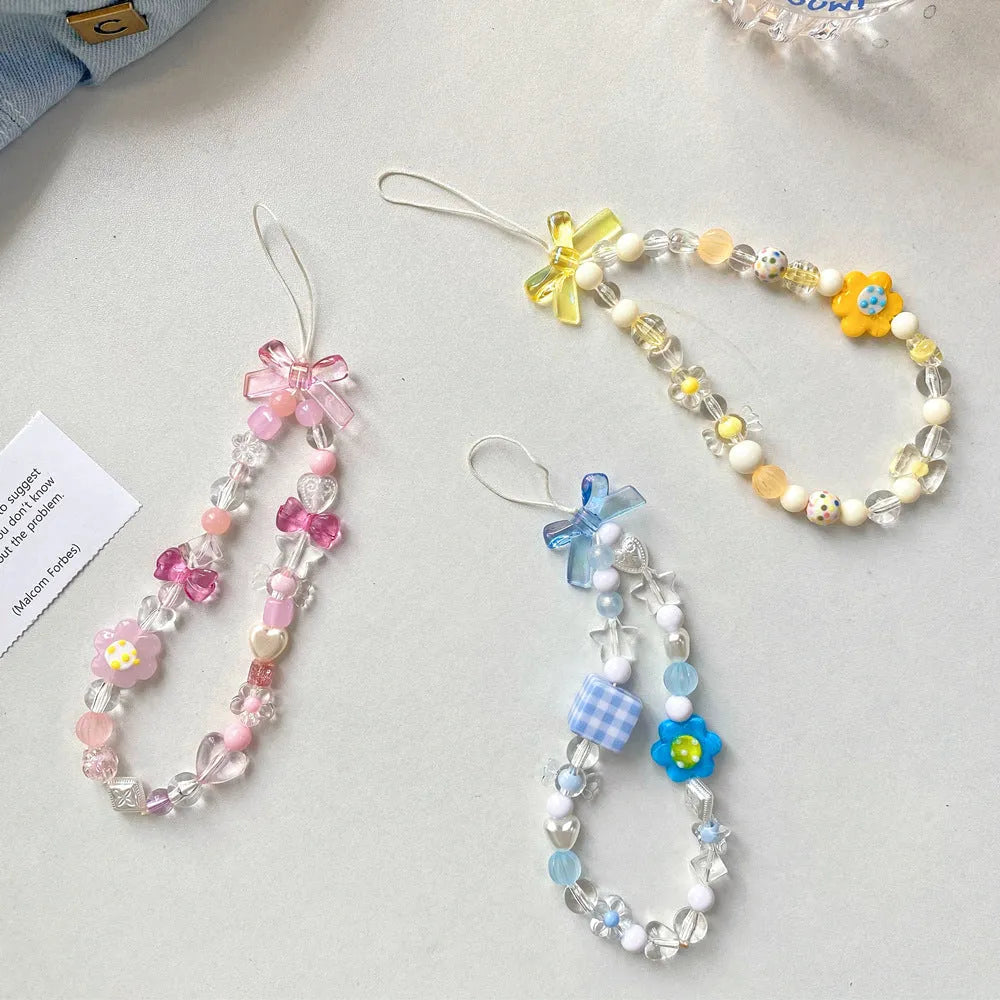 Colourful beaded flower mobile phone lanyard with detachable metal lobster clasp in blue, pink, or yellow designs