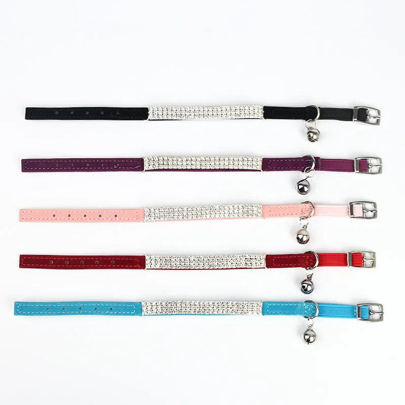 Velvet cat collar with rhinestones in red, blue, purple, black, or pink, showing adjustable buckle.