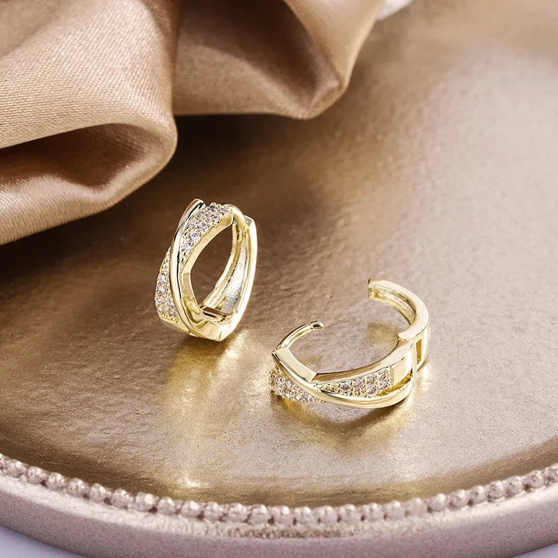 Copper geometric drop earrings with zircon detailing in 14K yellow finish