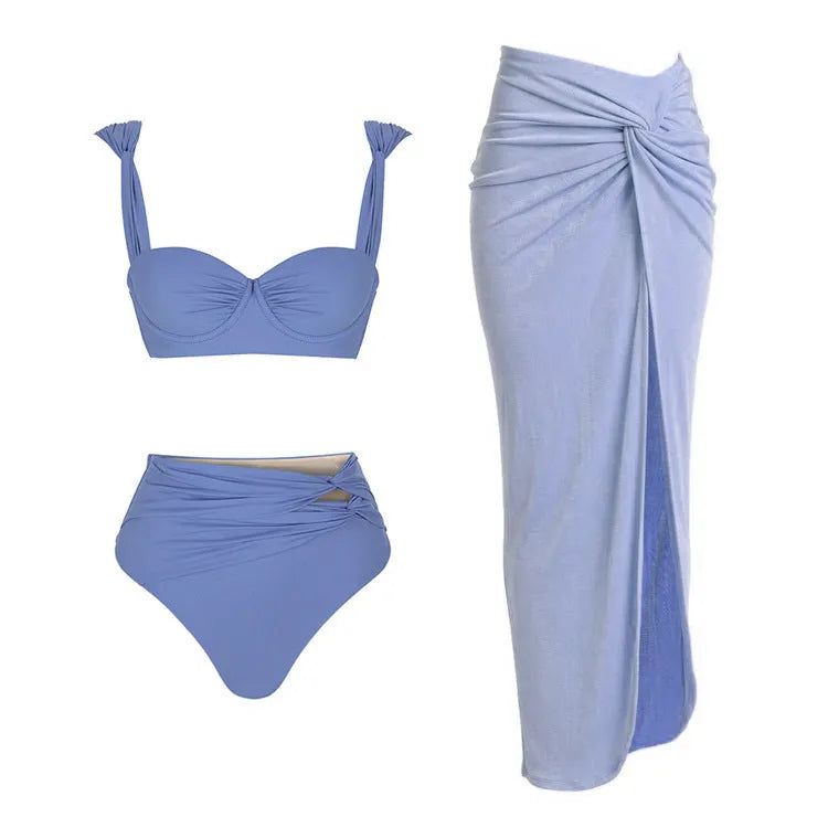 Women's solid colour one-piece swimsuit with gold buttons and a matching skirt in assorted colours
