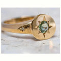 Golden star-shaped ring with oval zircon stone and adjustable opening