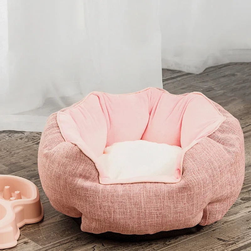 Blue octagonal pet sofa bed with a removable central mat for a small dog or cat.