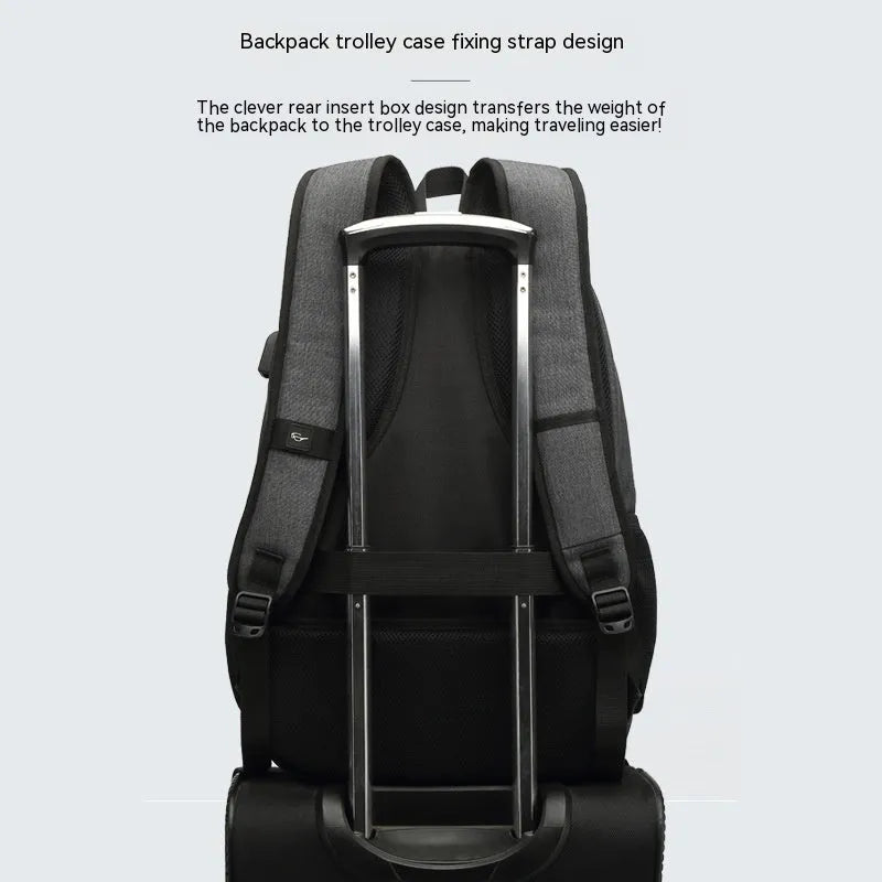 Grey and black lightweight backpack with USB charging port and trolley case attachment strap.