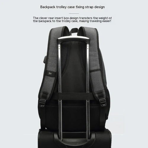 Grey and black lightweight backpack with USB charging port and trolley case attachment strap.