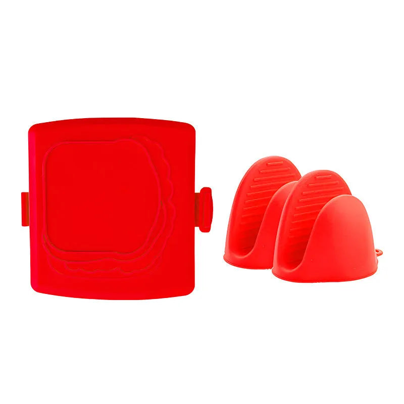 Red silicone baking tray and matching anti-scald gloves set on a kitchen counter.