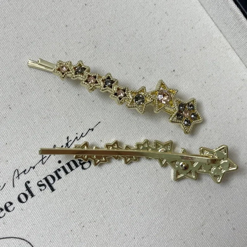 Gold rhinestone barrette with star design for clipping bangs and side hair