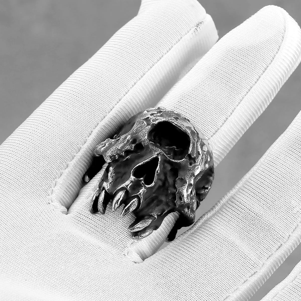 Alloy skull ring with one-eyed design and electroplated finish showing retro styling