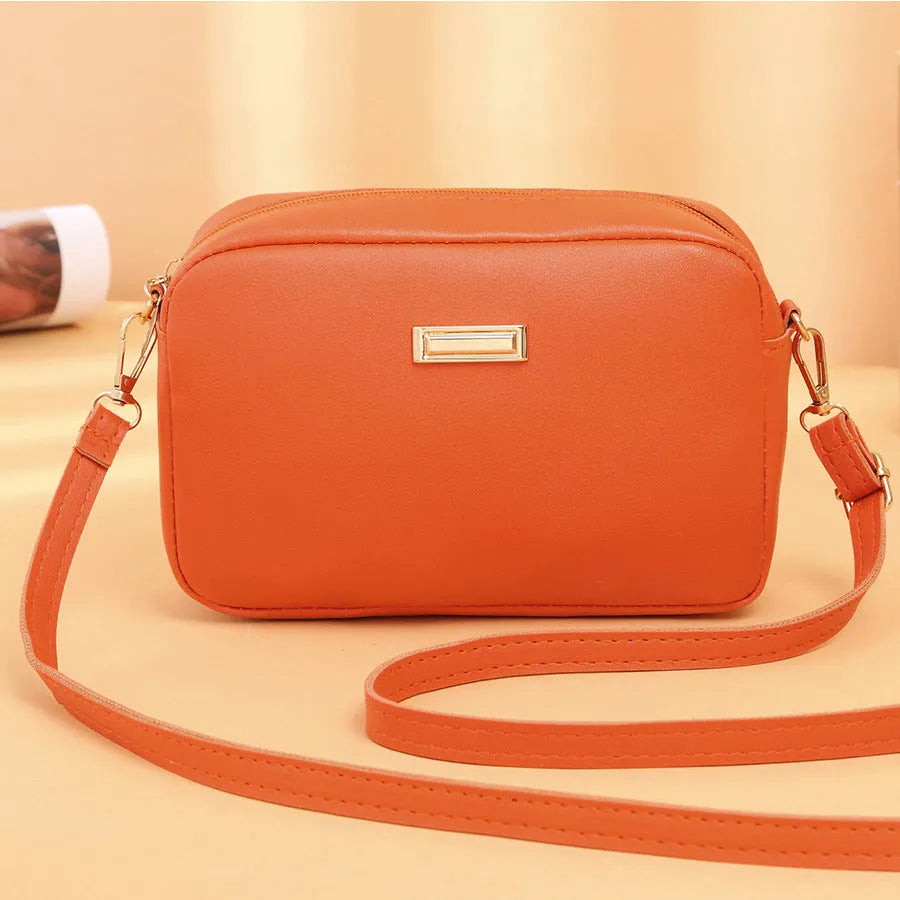 Women's solid colour PU leather shoulder bag with three-dimensional pockets in urban simplicity style