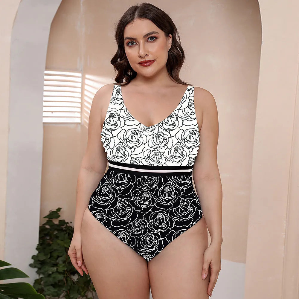 Women's blue printed one-piece swimsuit with spaghetti straps and a striped vest design