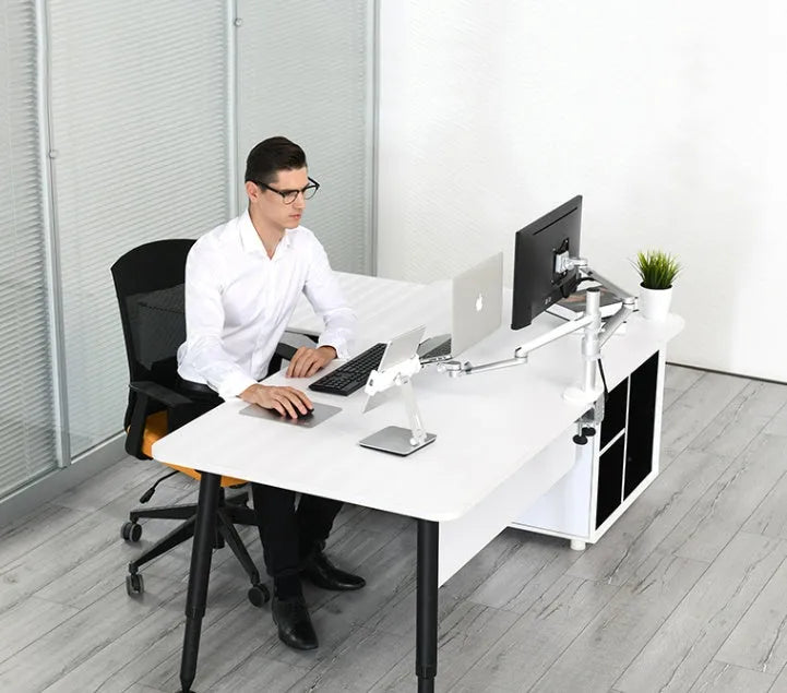 Folding aluminium phone and tablet stand on a desk, shown in silver colour with 360-degree rotation.