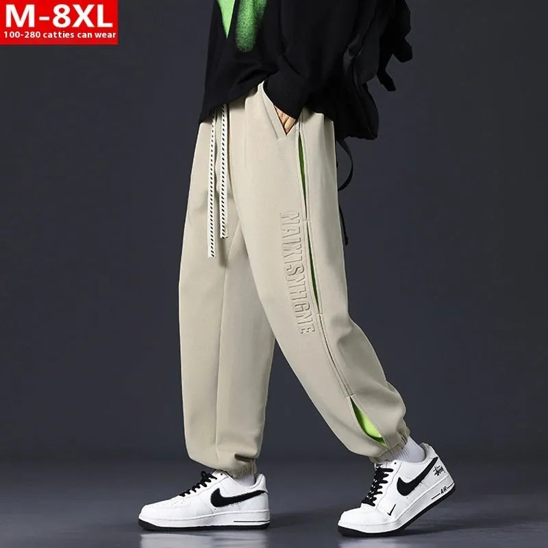 Men's loose fit trousers with stitching printing detail and banded ankle cuffs in micro elastic cotton fabric